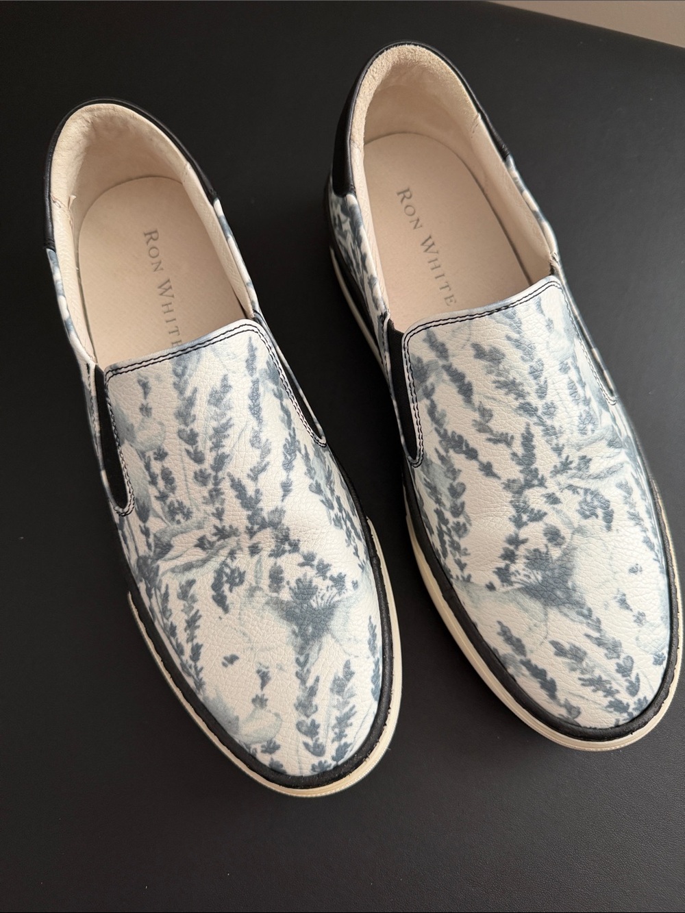 Ron White Women's Slip-On Sneakers in White/Grey Floral Print Black accents